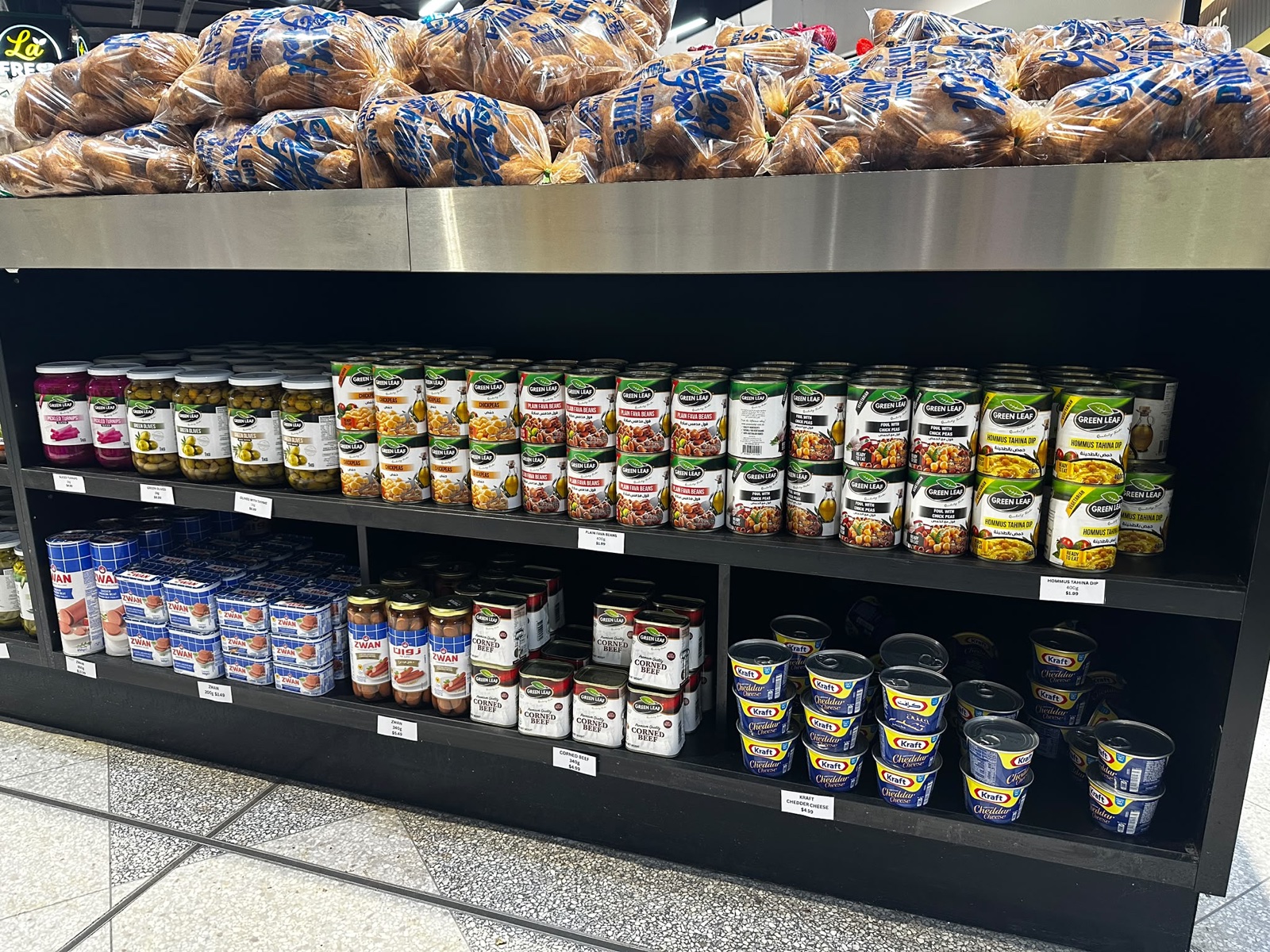 Canned beans, hummus, breads and grocery items